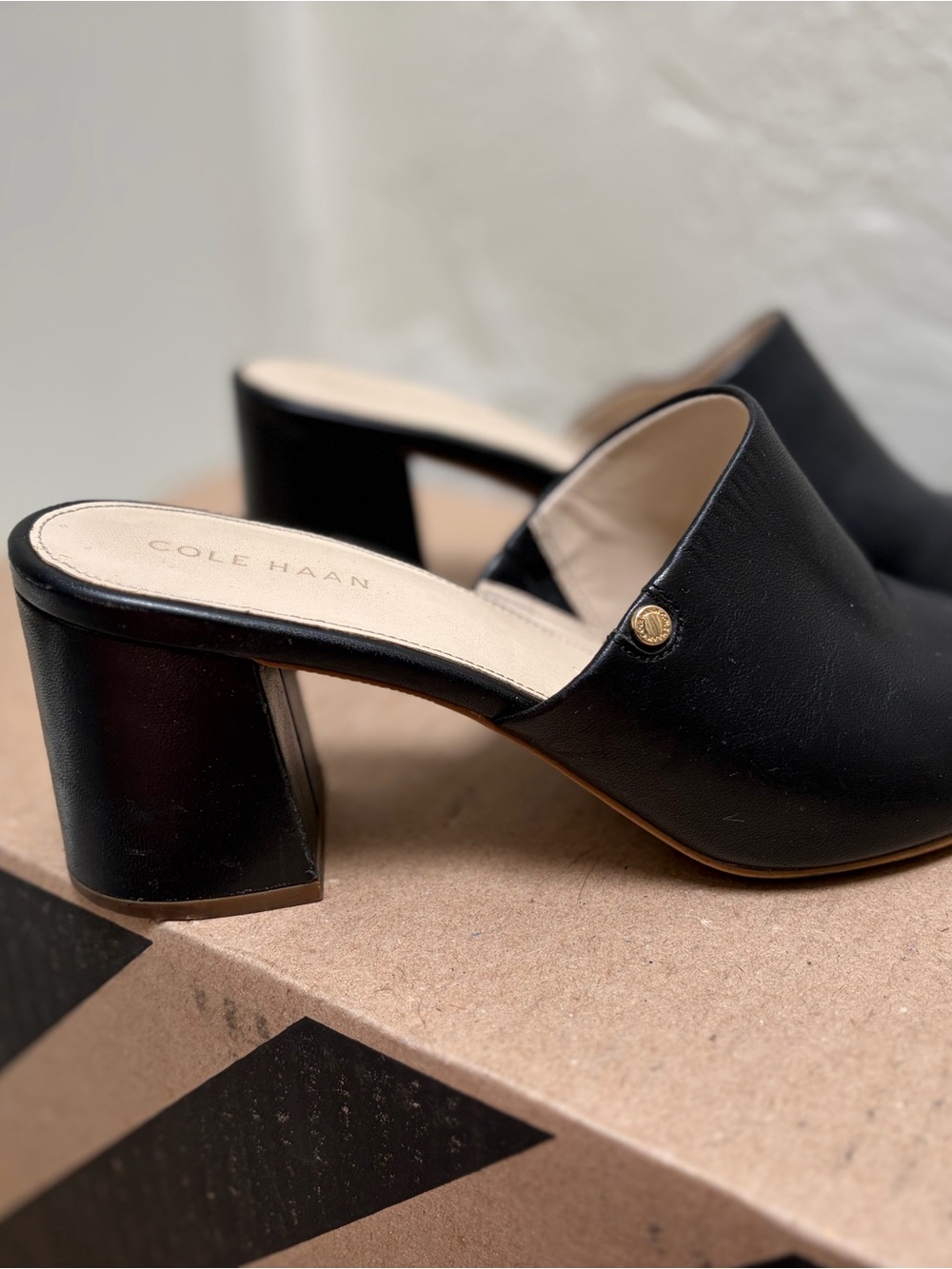 Cole Haan Black Leather Block Heel Mules with Gold Accent